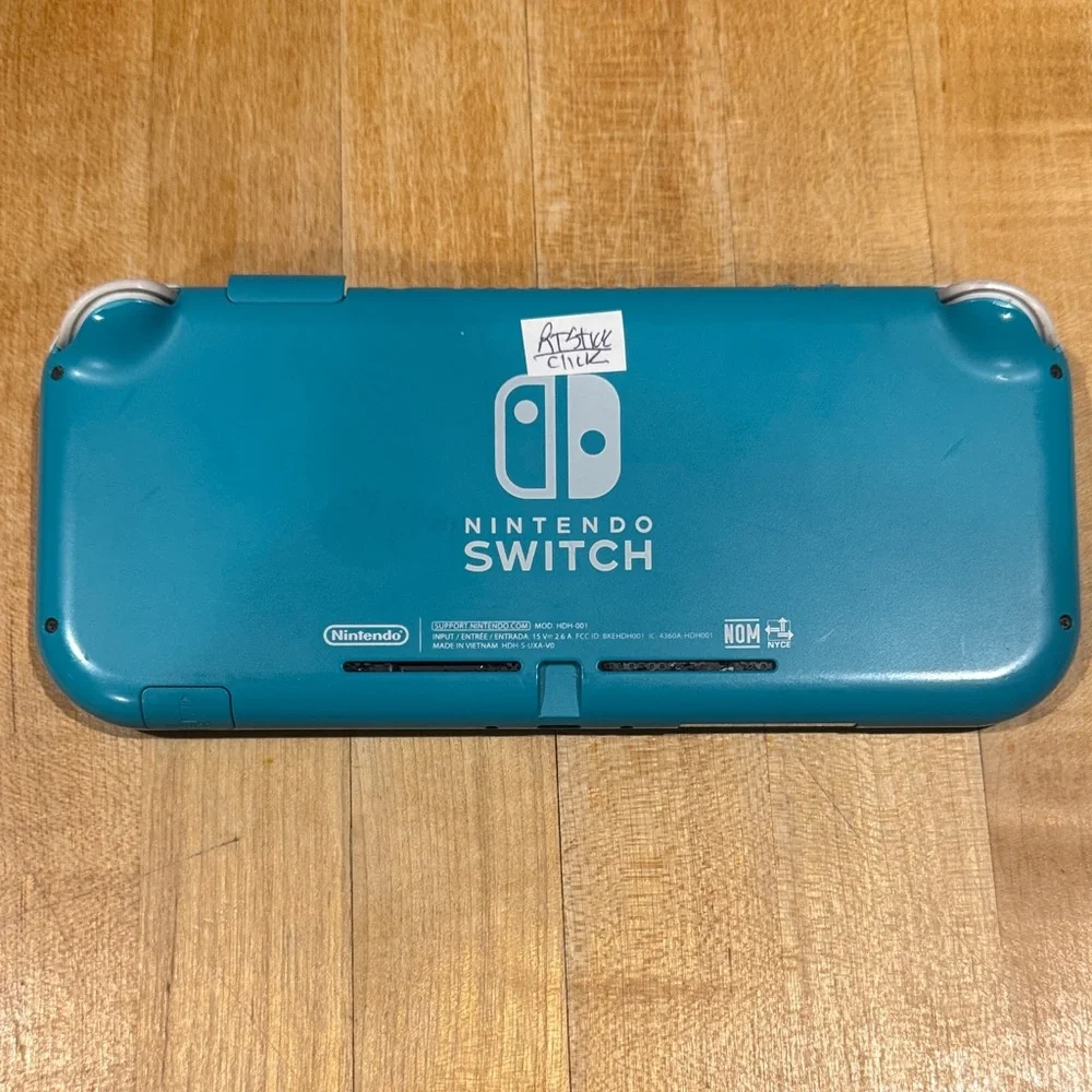 Nintendo Handheld Console - Teal as is